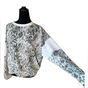 Peyton Jensen size large top. Snakeskin print.